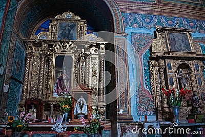 Altarpieces at the interior of Preciosa Sangre de Cristo church. Teotitlan del Valle, Oaxaca, Mexico Editorial Stock Photo