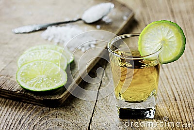 Tequila shot with lime and salt Stock Photo