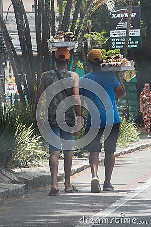 Two men selling sweets on the street in Teresopolis, Brazil Editorial Stock Photo