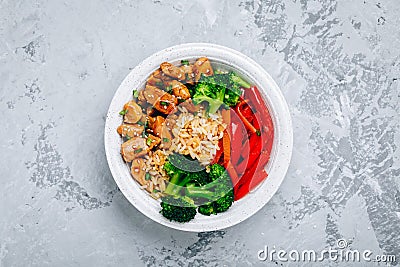 Teriyaki Chicken buddha bowl lunch with rice, broccoli and red bell pepper Stock Photo