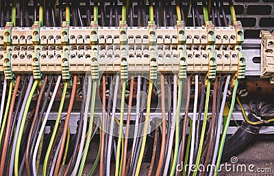 Terminal blocks for electrical connection and earthing terminals for grounding in the control cubicle. Close up Stock Photo