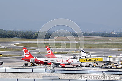 Terminal spotting at Vienna Airport with Air Berlin Airbus a320 and Finnair Embraer erj190 in the beautiful shot Editorial Stock Photo