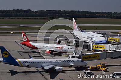 Terminal Spotting at Vienna Airport with China Airlines Boeing 747-400, Niki Airbus a320 Ukraine Internatiol Embraer erj190 Editorial Stock Photo