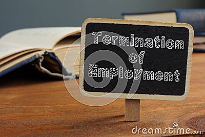 Termination of Employment is shown on the conceptual business photo Stock Photo