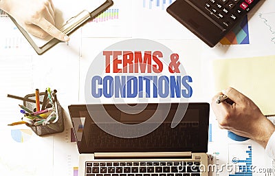 Terms and conditions.Business team hands at work with financial documents Stock Photo