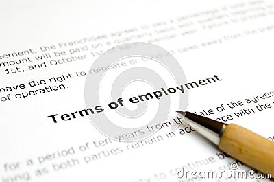 Terms of employment with wooden pen Stock Photo