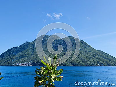 Ternate city is surrounded by mountains and very beautiful beaches, one of which is Mount Gamalama Stock Photo