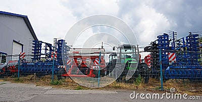 Large disc plough, towing for tractors to plow fields Editorial Stock Photo