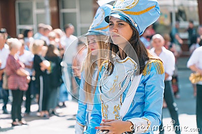 Ternopil, Ukraine July 31, 2020: Street performance of festive march of drummers girls in blue costumes on city street Editorial Stock Photo