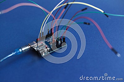 TERNOPIL, UKRAINE - May 5, 2019: Arduino Uno board micro controller for the development of simple automation systems and robotics Editorial Stock Photo