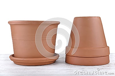 Terra cotta flower pots empty on a table background Stock Photo