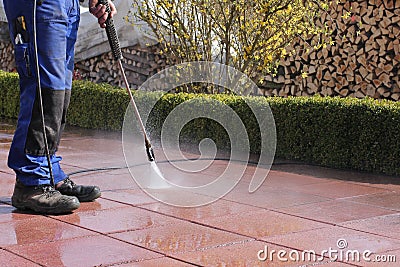 Terrace cleaning with high-pressure Stock Photo