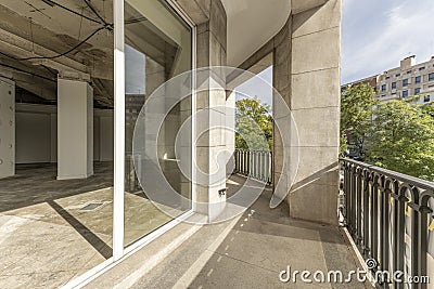 Terrace of an empty stately office in which reconditioning works are being carried out Stock Photo