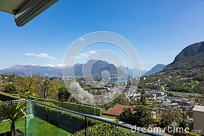 Terrace overlooking the lake of Lugano Stock Photo