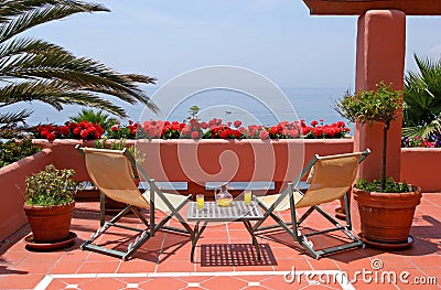 Terrace, table, chairs and sea views Stock Photo