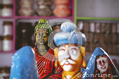 Terracotta Buddha in antique shop Stock Photo