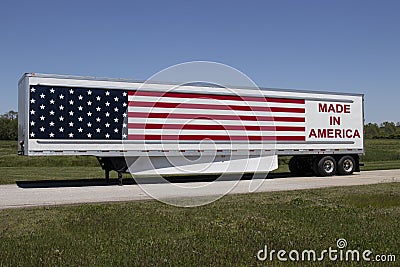 Big rig truck with the motto Made In America painted on the side with stars and stripes of the American flag Editorial Stock Photo