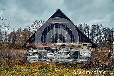 A terrible mysterious apocalyptic view: an abandoned house in the abandoned Belarusian Kovali Belarusian: blacksmiths village - Stock Photo