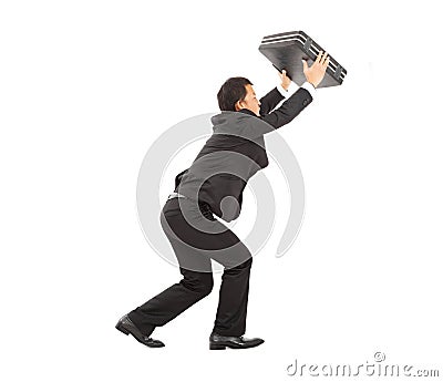 Terrified businessman using briefcase to protect. Stock Photo