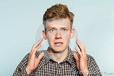 Terrified shocked alarmed man distress emotion Stock Photo