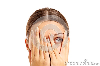 Terrified woman covering her face Stock Photo