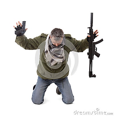 Terrorist with hands up Stock Photo