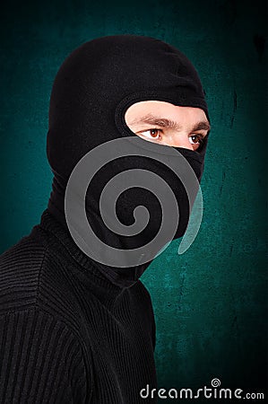 Terrorist in mask Stock Photo