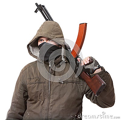 Terrorist with weapon Stock Photo