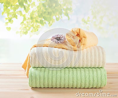 Terry towels stack, differnt colors towels in stack Stock Photo
