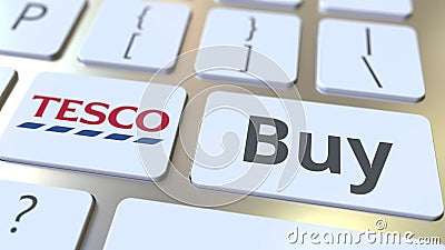 TESCO company logo and Buy text on the keys of the computer keyboard, editorial conceptual 3D rendering Editorial Stock Photo