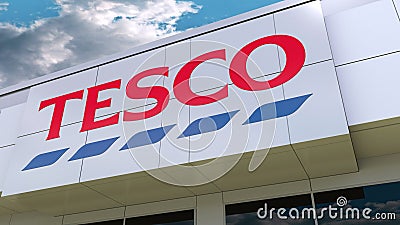 Tesco logo on the modern building facade. Editorial 3D rendering Editorial Stock Photo