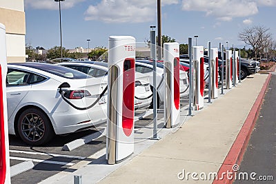 Tesla charging station pumps Editorial Stock Photo
