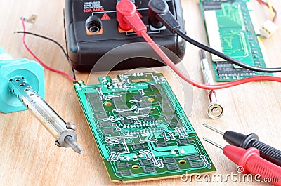 Test repair job on electronic printed circuit boar Stock Photo