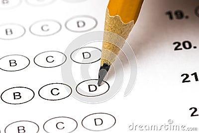 Test score sheet with answers and pencil . Closeup Stock Photo