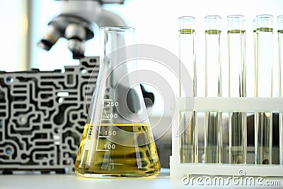 Test tube chemistry flask against background Stock Photo