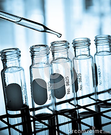 Test tube containing chemical liquid in laboratory, lab chemistry or science research concept. Stock Photo