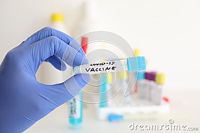 Test tube with covid-19 coronavirus flu vaccine Stock Photo