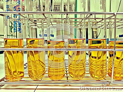 Test tube of LST broth for coliform test in food factory lab Stock Photo