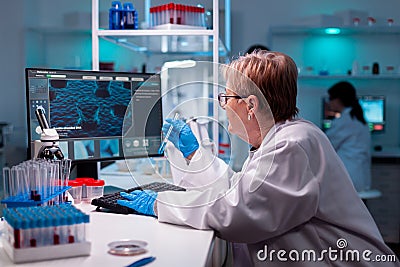 Test tube in modern engineering laborator medical virus Stock Photo