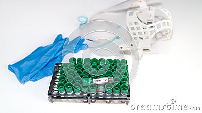 Test tubes with SARS-CoV-2 blood samples in a rack. Coronavirus diagnostic lab Stock Photo
