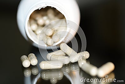 Supplement muscle growth extract in caps Stock Photo