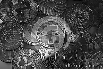 Tether USDT Bitcoin and other crypto altcoins placed on top of each other and lit with selective lights. Editorial Stock Photo