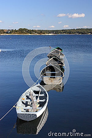 Tethered dories Stock Photo