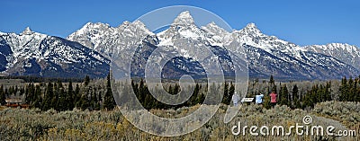 Teton Mountains with tourists looking Stock Photo