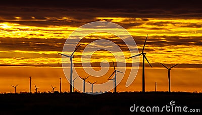 Texas Wind Energy Turbines across the Sunrise Stock Photo