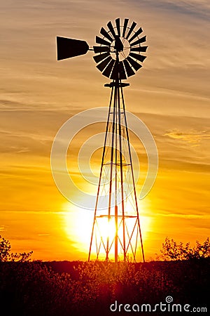 Texas wind pump sunset Stock Photo