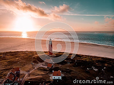 Texel lighthouse during sunset Netherlands Dutch Island Texel Stock Photo