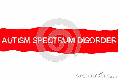 Text AUTISM SPECTRUM DISORDER appearing behind red torn paper Stock Photo