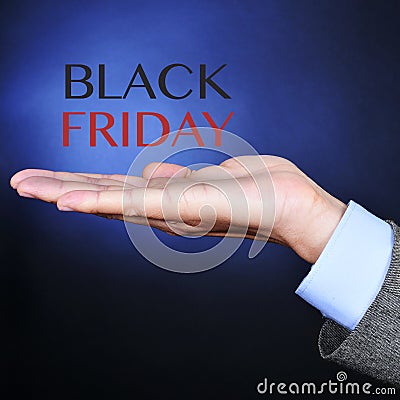 Text black friday in the hand of a businessman Stock Photo