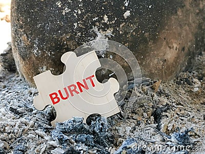 Text burnt on wooden jigsaw puzzle. Stock Photo